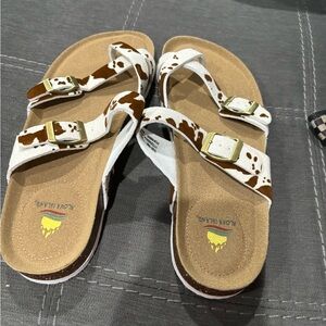 NEW never worn cowprint sandals! Size 10